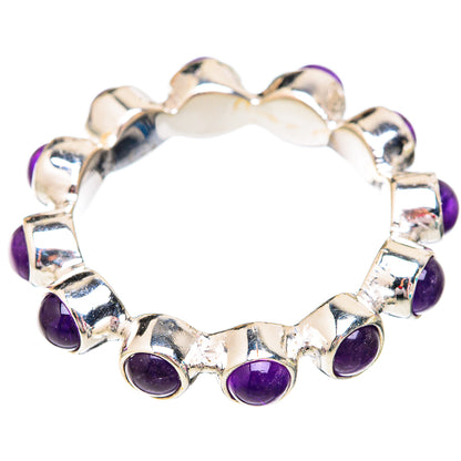 Amethyst sterling silver ring with oval purple gemstones on a polished band.