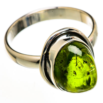 Oval green tourmaline set sterling silver ring, high-shine band