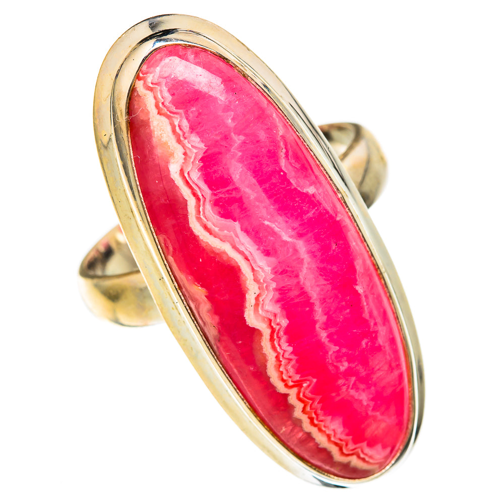 Large rhodochrosite ring, oval pink cabochon with open silver bezel and split shank