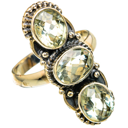 Sterling silver ring with three faceted oval green amethyst stones, ornate setting
