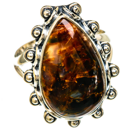 Oval amber pietersite cabochon sterling silver ring with beaded halo and open setting