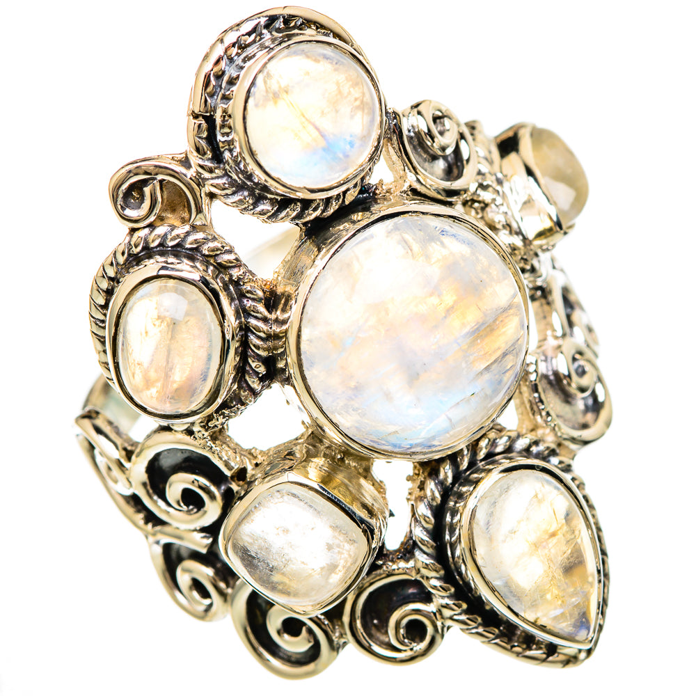 Sterling silver moonstone ring with large oval center stone and four smaller cabochons