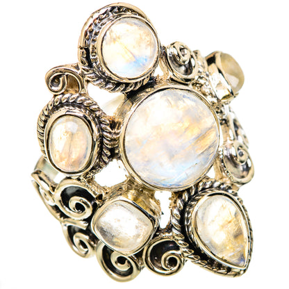 Sterling silver moonstone ring with large oval center stone and four smaller cabochons