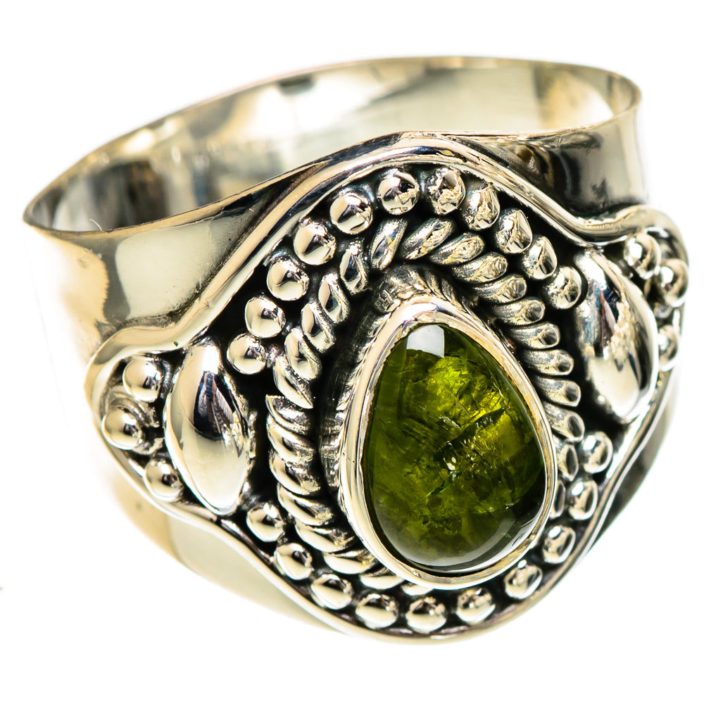 Sterling silver ring with oval green tourmaline and ornate beaded bezel, side view