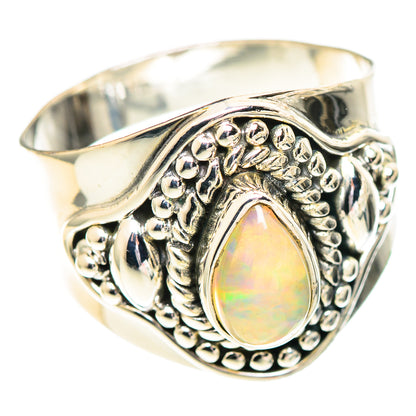 Sterling silver opal ring with oval cabochon and ornate beaded filigree