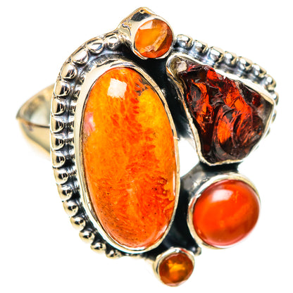 Sterling silver statement ring with oval orange cabochon, red round stone, and dark red side stone