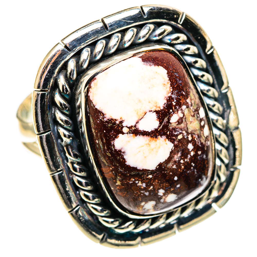 Silver oval jasper cabochon ring with braided metal border and heart mottling