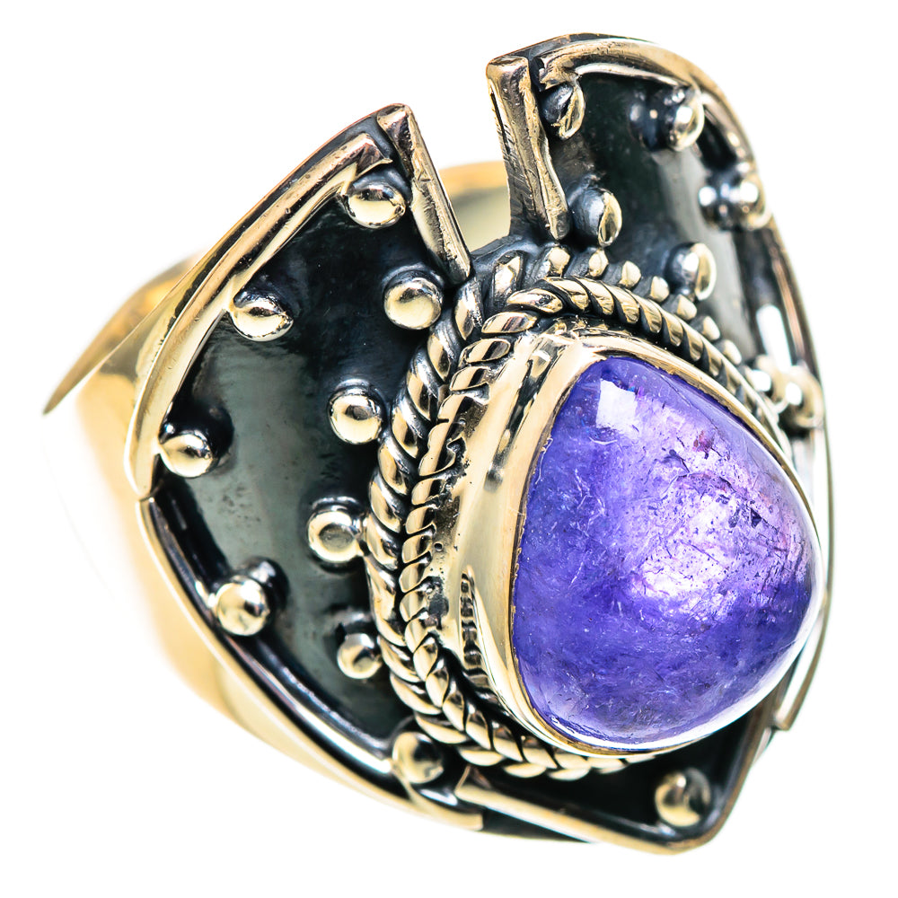 Purple oval gemstone ring with braided sterling silver borders and dark metal base