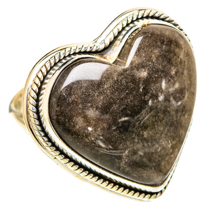 Heart-shaped dark obsidian ring with textured rope border and metal band