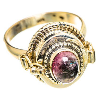 Pink tourmaline oval gemstone ring in ornate gold-tone sterling silver setting