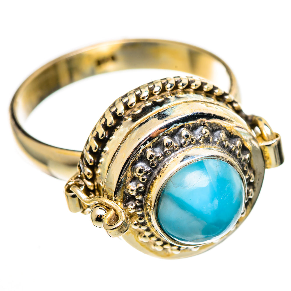 Sterling silver ring with oval blue larimar stone, ornate bead and scroll setting