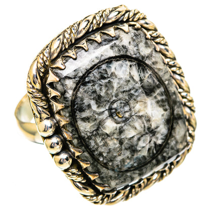 Large oval fossil stone ring in 925 silver with jagged bezel and braided edge, size 10.25