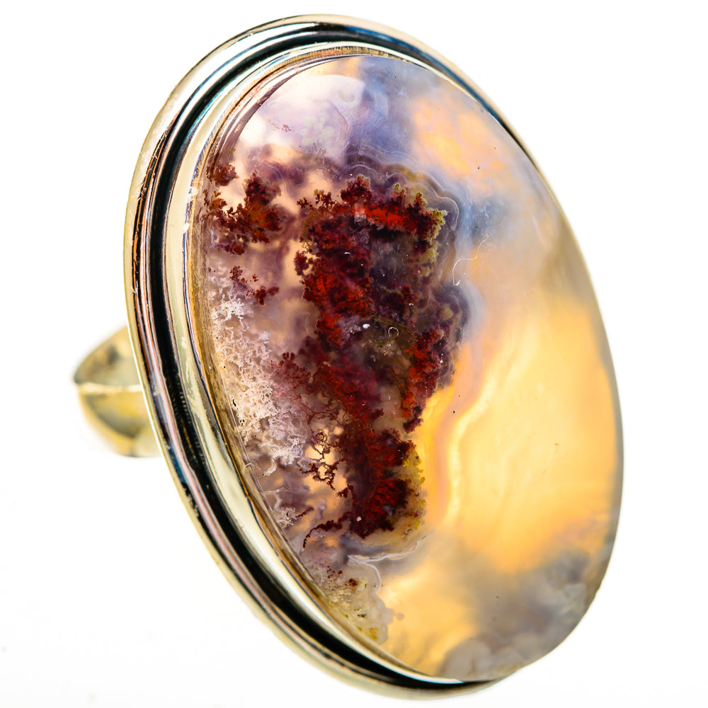 Sterling silver oval plume agate ring with a dark red and purple mineral design