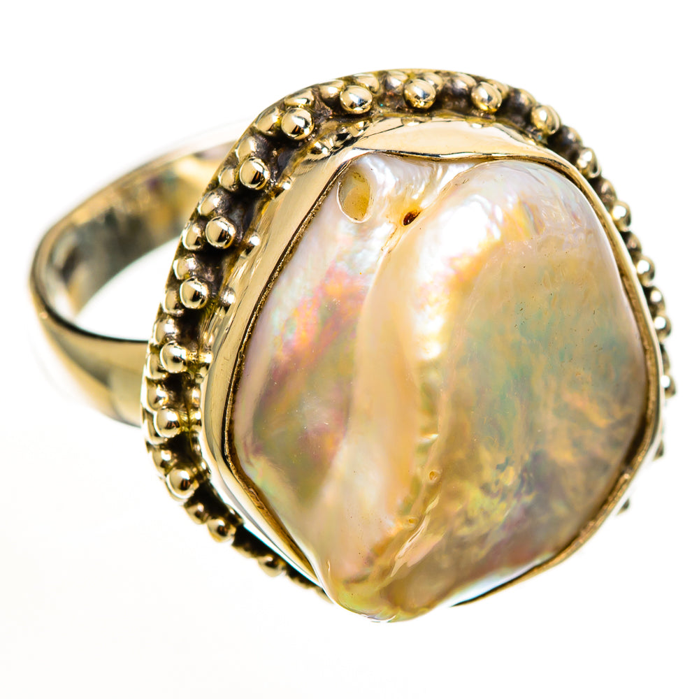 Sterling silver mother-of-pearl ring, beaded bezel with oval iridescent stone