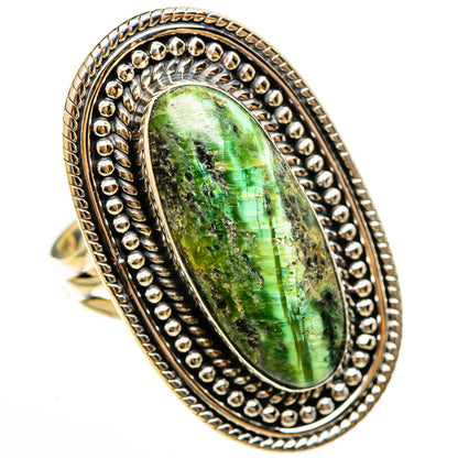 Oval green opal set in 925 sterling silver ring with ornate double beaded frame