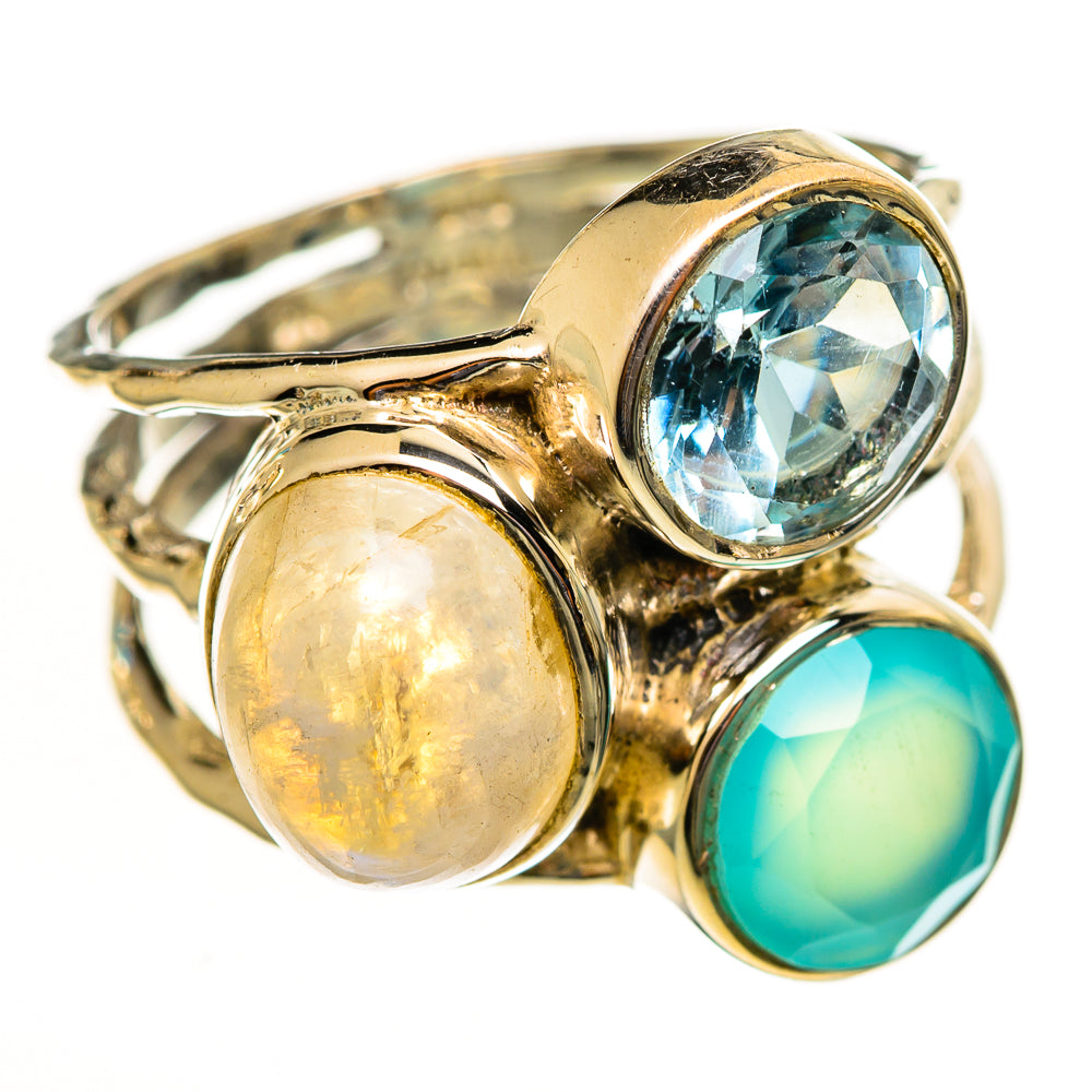 Gold-tone gemstone ring with blue oval, yellow round, and turquoise round stones