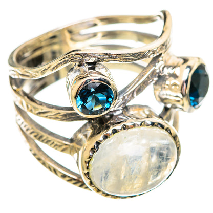 Sterling silver gemstone ring with oval moonstone center and blue round stones