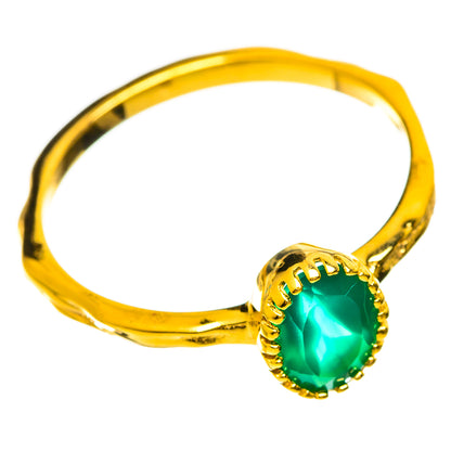 Gold-plated green onyx oval ring with scalloped bezel on gold band