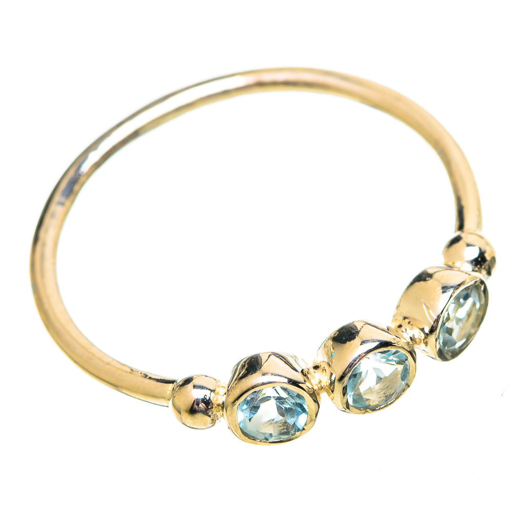 Sterling silver ring with three oval blue gemstones in bezel settings