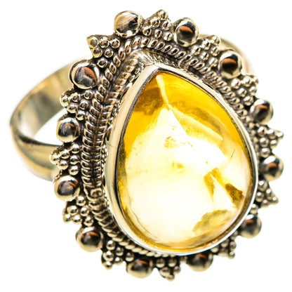 Sterling silver citrine sugarloaf ring with raised bezel and textured bead border