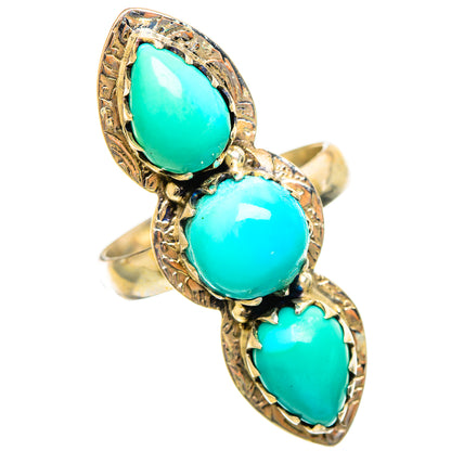 Large turquoise cabochon ring in ornate 925 sterling silver, side view of 3 stones