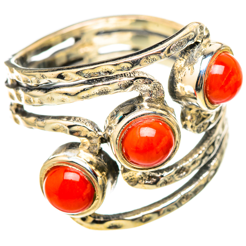 Sterling silver open-style ring with three red coral cabochon stones, side view
