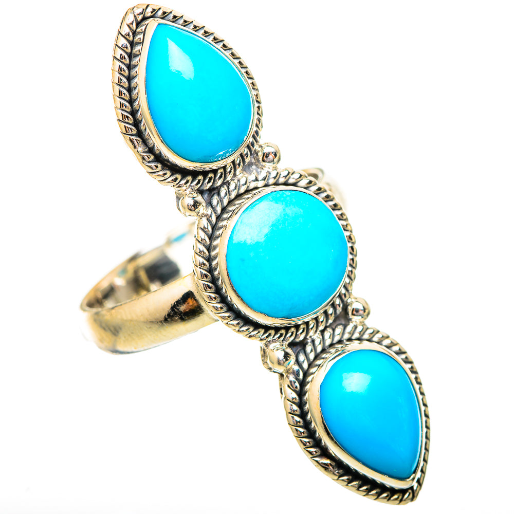 Turquoise oval gemstone ring, three-stone design with ornate silver rope bezel