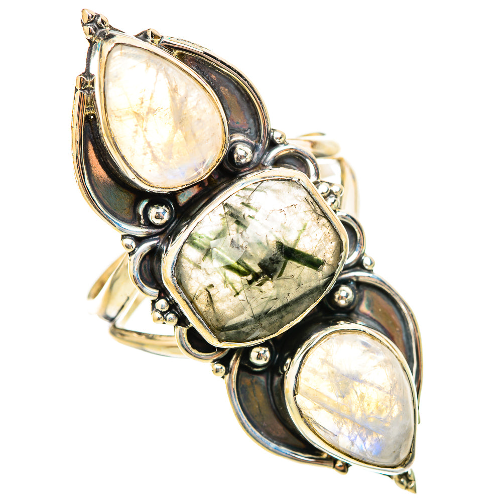 Sterling silver ring with three prong-set oval gemstones, opalescent and green tones