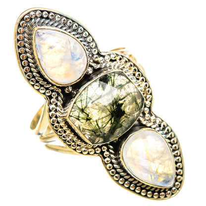 Sterling silver ring with two oval opal cabochons, central green quartz, and bead bezel trim