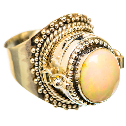 Sterling silver opal ring, oval opal cabochon in braided and beaded band setting