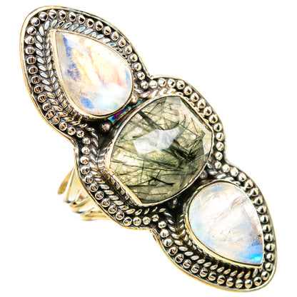 Sterling silver three-stone ring with green center and two opalescent oval stones