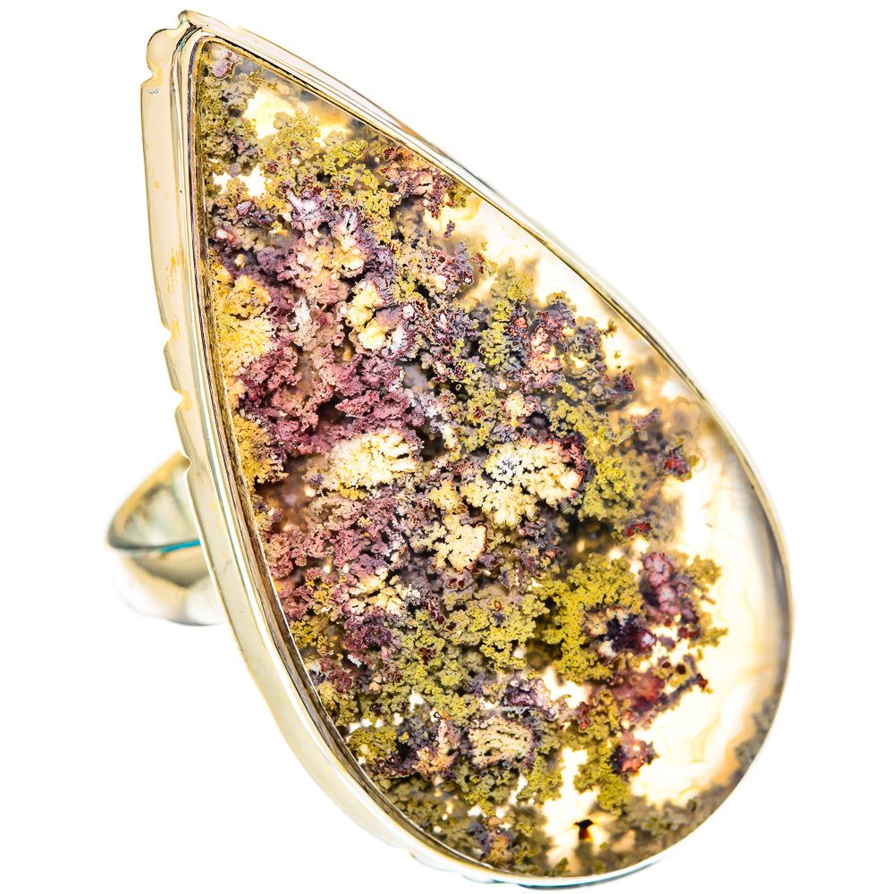 Silver-tone teardrop ring with gold, purple, and pink plume agate crystal face