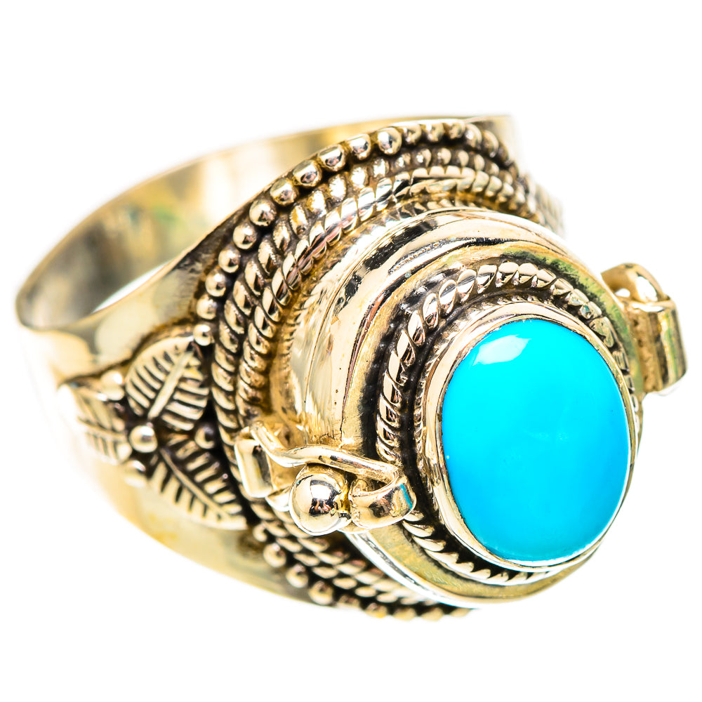 Silver-tone statement ring with turquoise oval center and engraved band