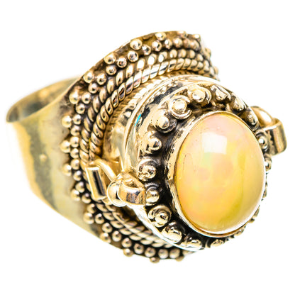 Sterling silver ring with oval Ethiopian opal cabochon and detailed beadwork band