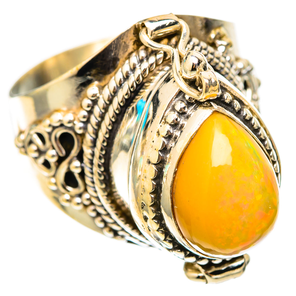 Poison Natural sterling silver opal ring, side view, oval orange-yellow cabochon bezel