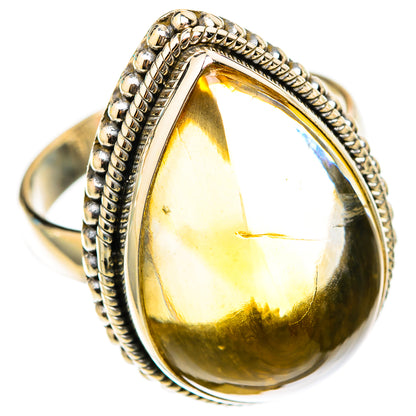 925 sterling silver citrine sugarloaf ring with bright yellow teardrop gemstone, side view