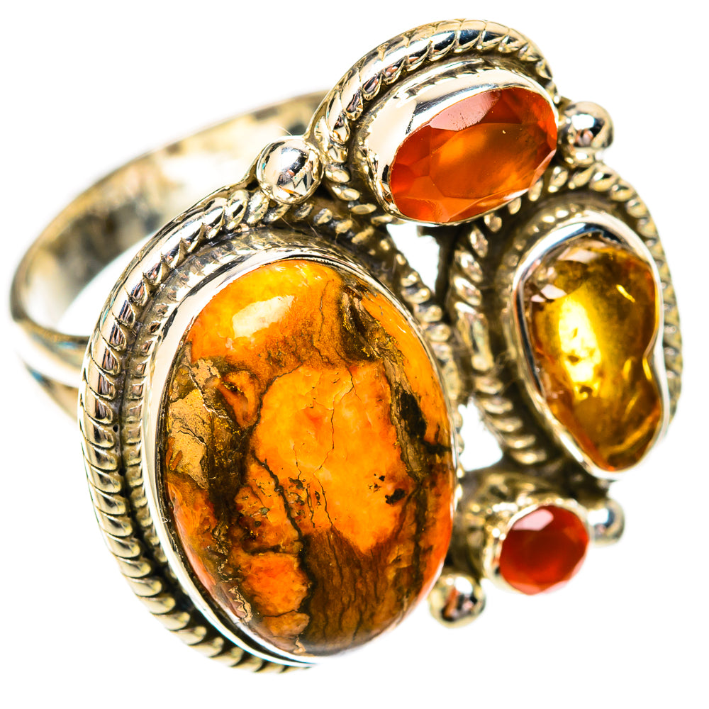 Orange oval gemstone ring with amber and red stones, sterling silver bezel setting