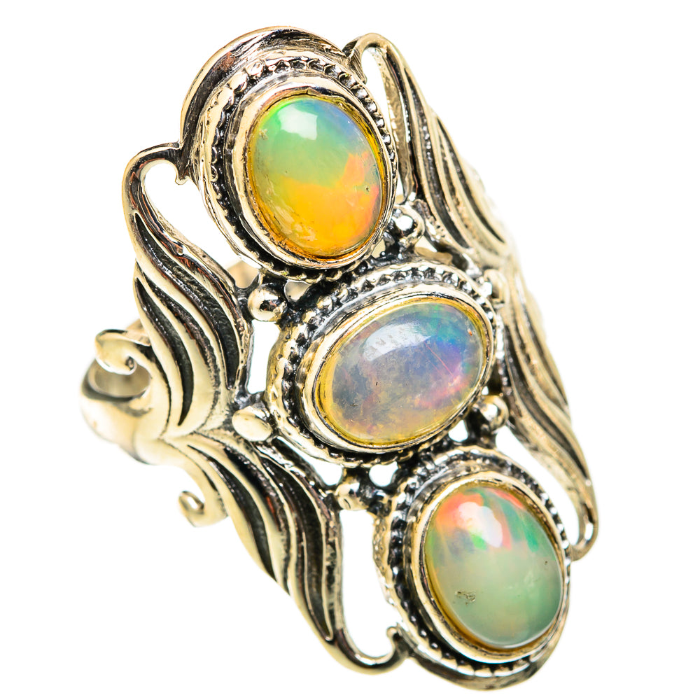 Sterling silver opal ring with three oval opals and detailed filigree leaf bands