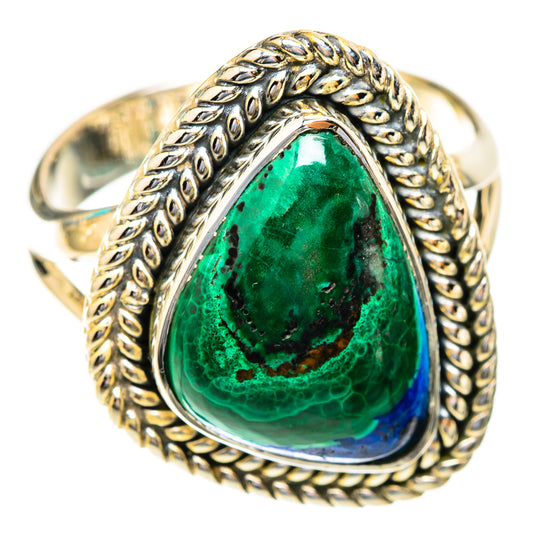 Sterling silver ring with ornate gallery and teardrop green stone