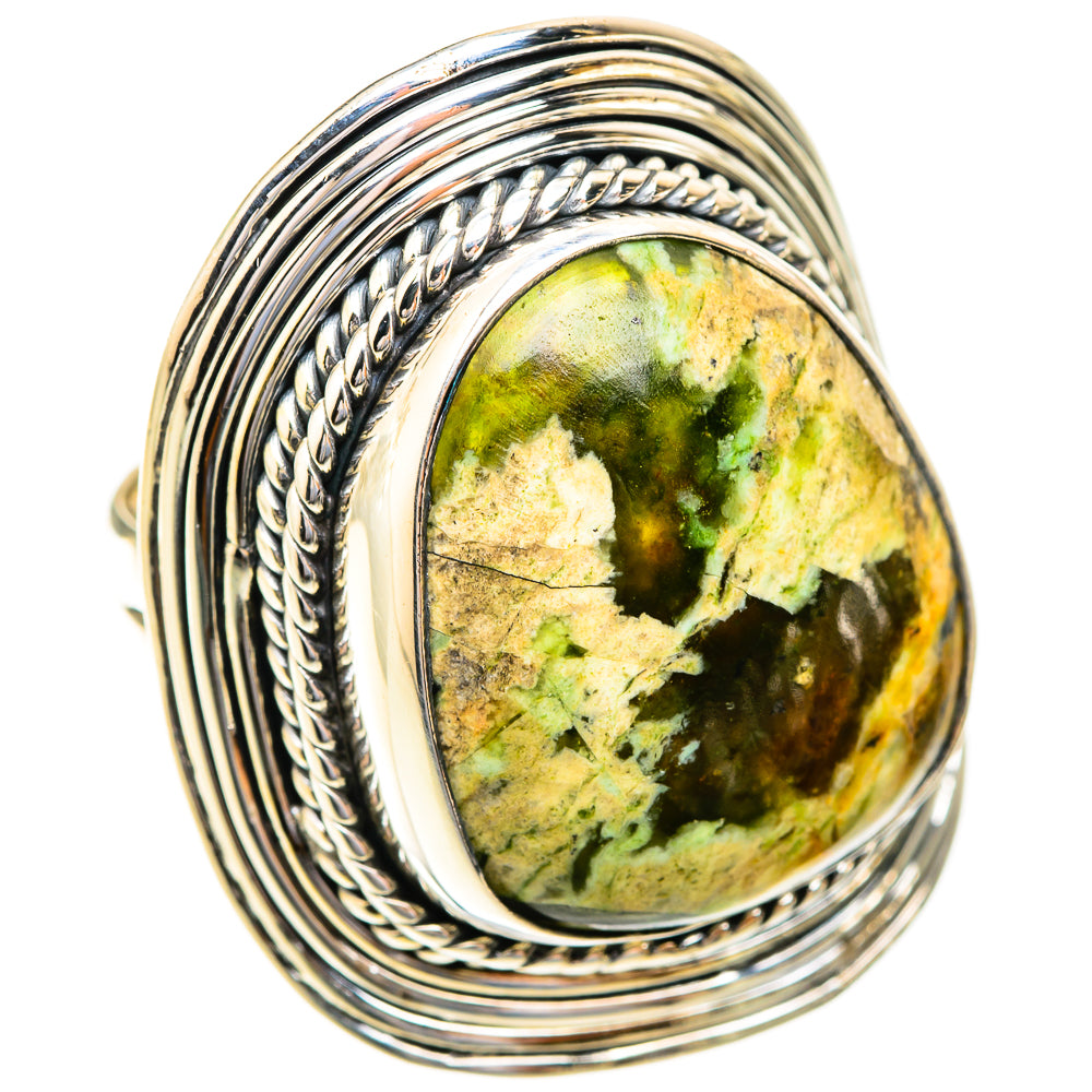 Sterling silver opal ring with oval green-and-gold stone, rope design and stacked bands