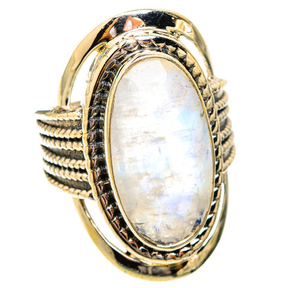 Iridescent oval moonstone ring in ornate sterling silver setting, side view