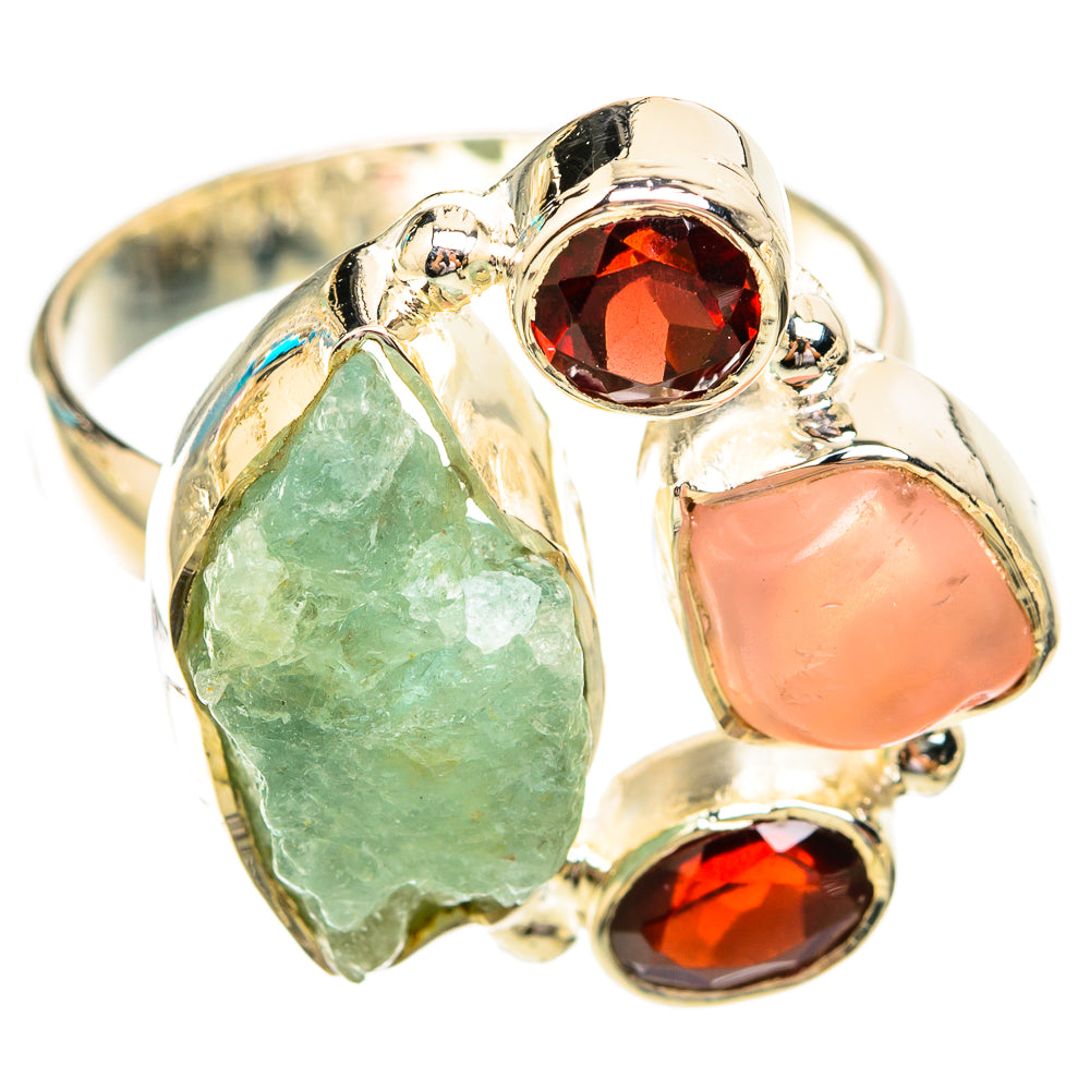 Sterling silver ring with rough green, peach pink, and red gemstone cabochons