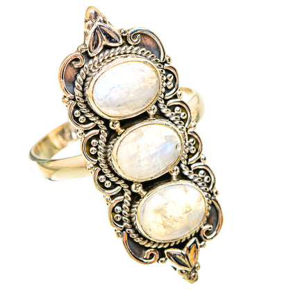 Three-stone moonstone ring with oval cabochons and ornate metalwork, size 11.5