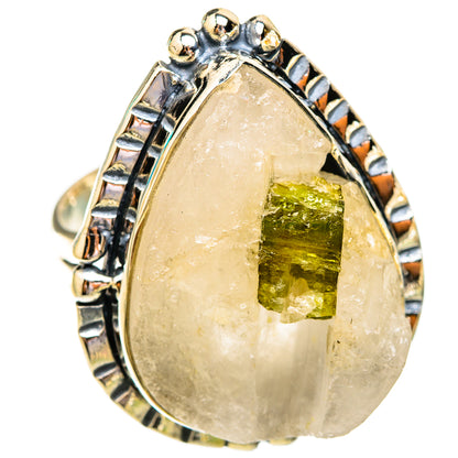Silver-tone teardrop ring with quartz and green tourmaline crystal center, openwork band