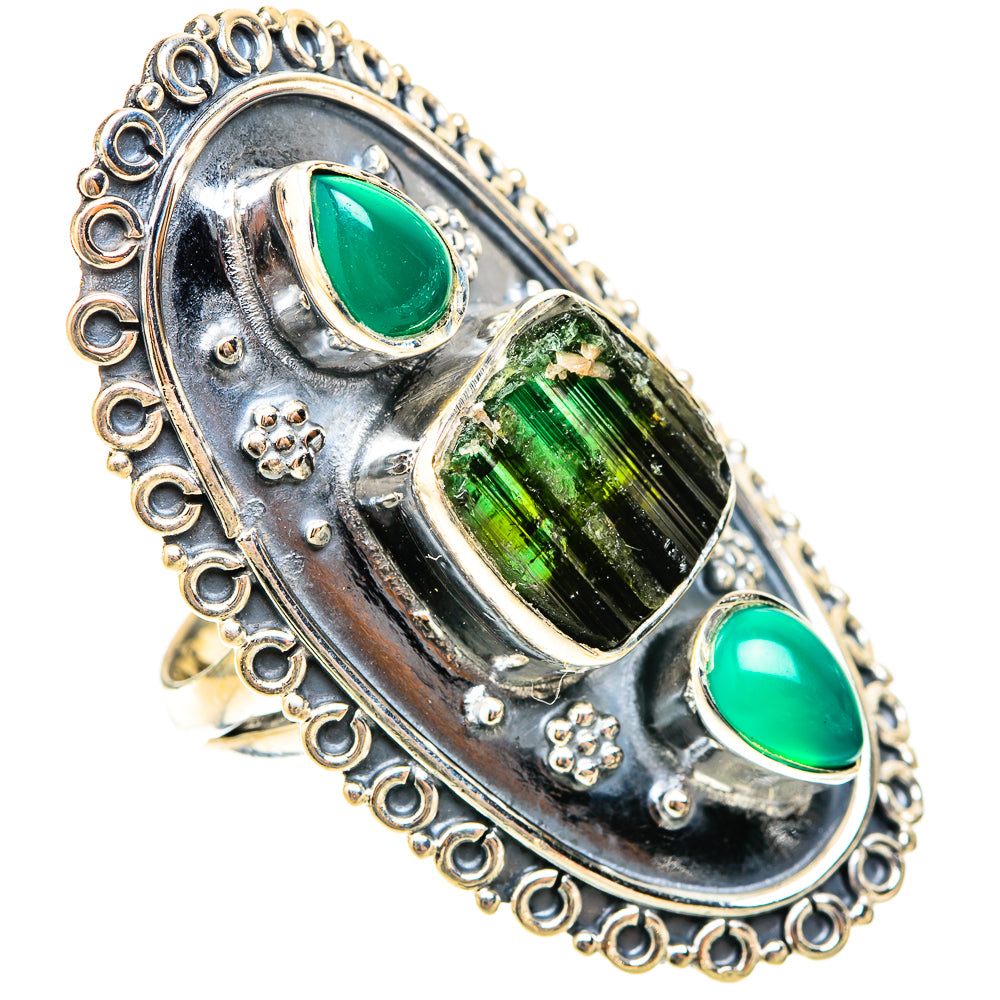 Sterling silver ring with three green stones: two cabochons and rough rectangular centerpiece