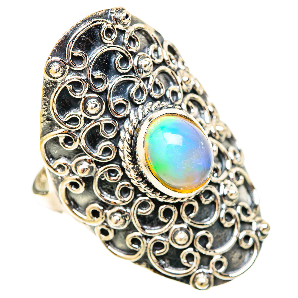Sterling silver filigree opal cabochon ring, oval rainbow glow, ornate openwork band