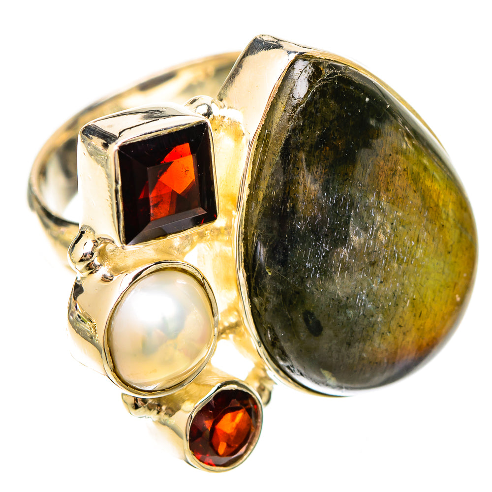 Sterling silver ring with large oval labradorite, white pearl, and red garnet stones