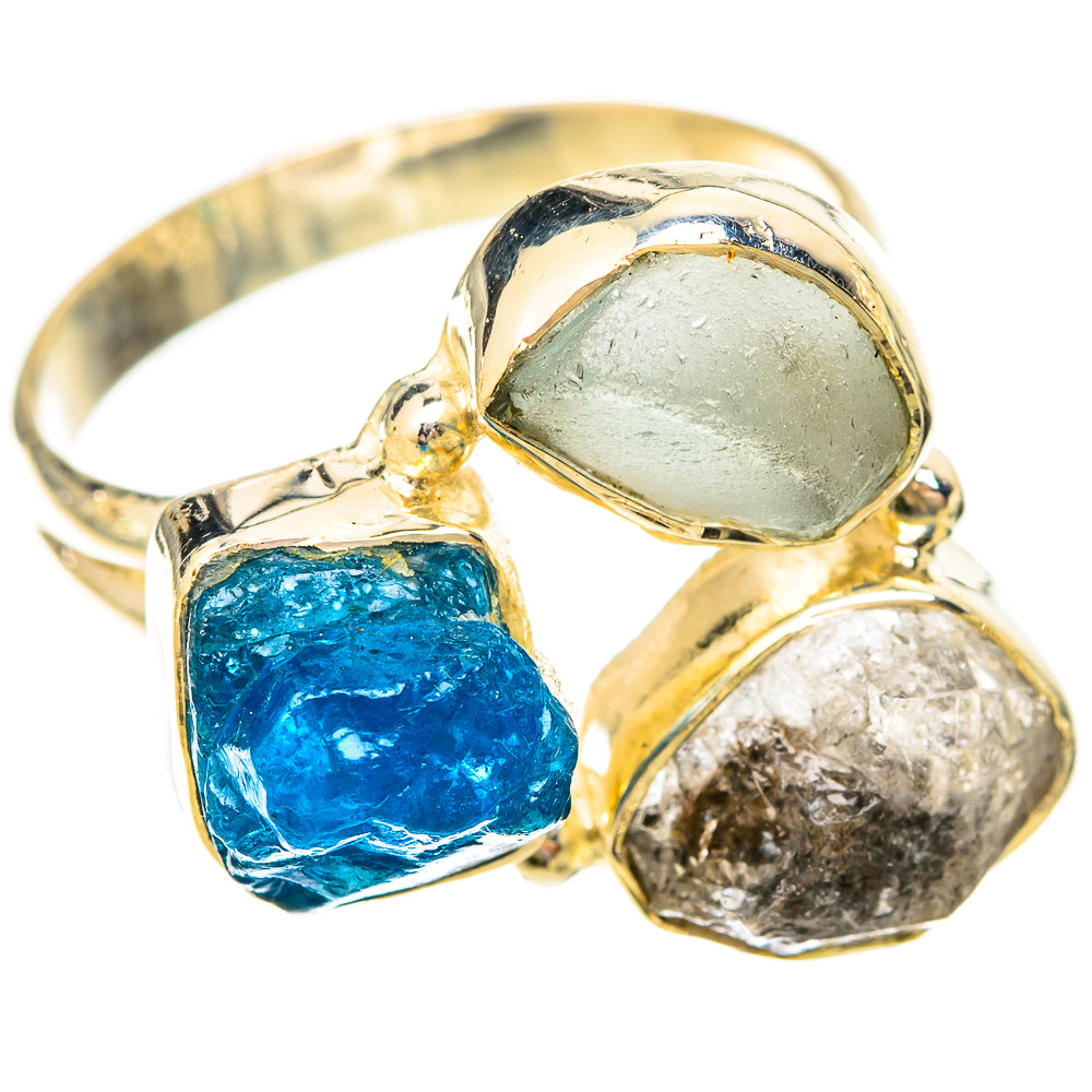 Gold-tone sterling silver ring with rough blue, pale green, and clear stones
