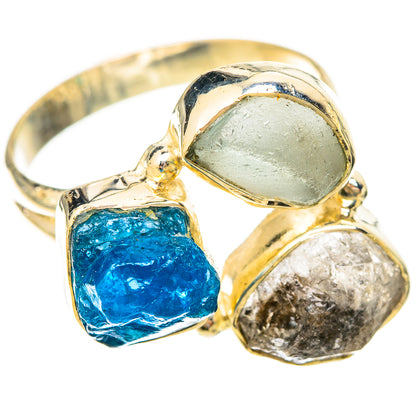 Gold-tone sterling silver ring with rough blue, pale green, and clear stones