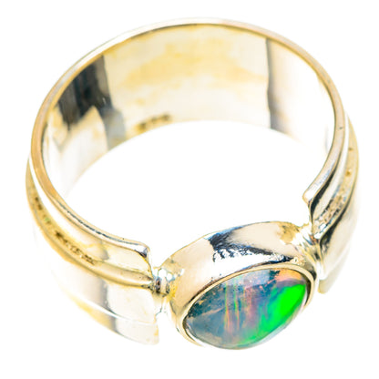 Sterling silver oval opal cabochon ring with green-blue flash